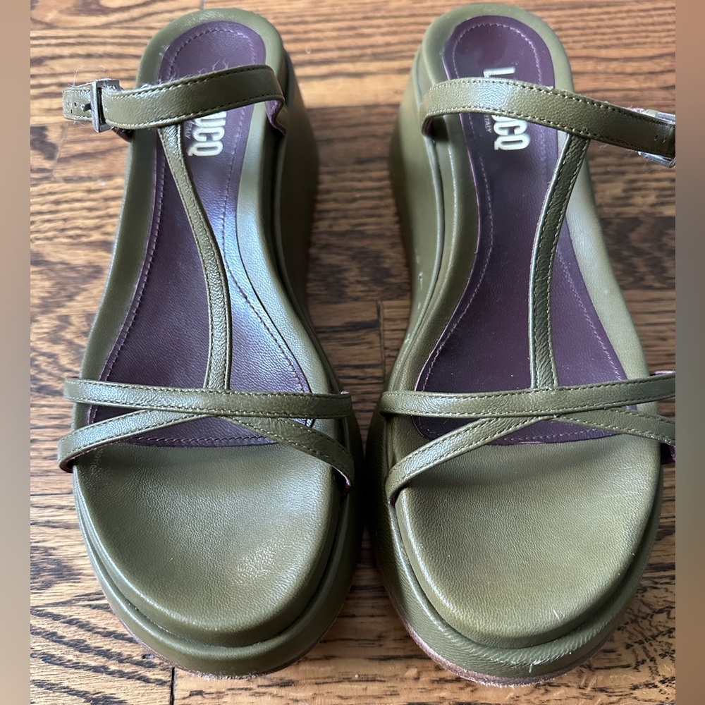 Labucq green leather platform sandals.